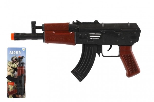 Glødende ARMY maskinpistol på svinghjul plast 29cm på kort 14x38x2,5cm