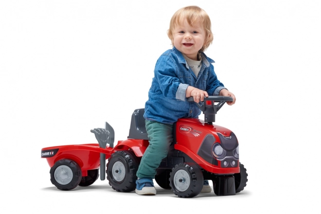 Kørende traktor Baby Case IH rød med trailer
