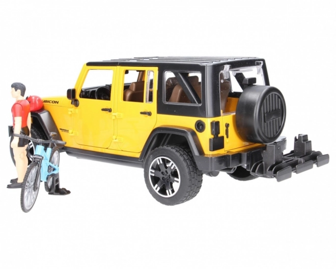 Bruder Jeep Wrangler Rubicon med cyklist og cykel