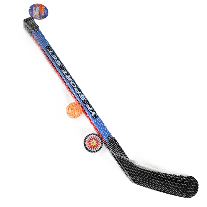 Hockeystænger med bold og puck