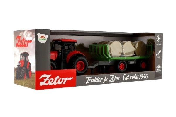 Traktor Zetor med anhænger og plastballer 36cm med friktion kører på batteri med lys og lyd i æske 39x13