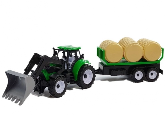 Traktor med trailer til høballer og tankvogn