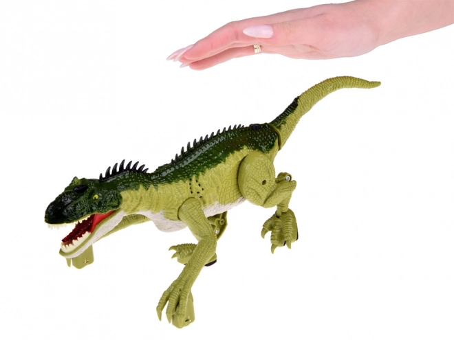 Grøn dinosaur med fjernbetjening