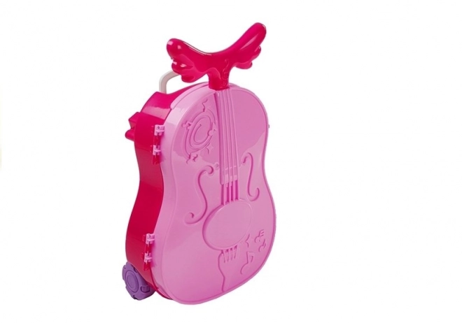 Toiletbord i form af en violin med hjul og spejl i en kuffert