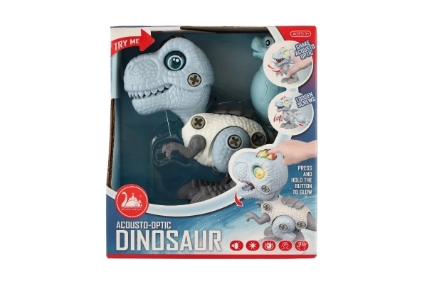 Dinosaurus skruelig plast 12cm med skruetrækker til batterier med lys og lyd i æske 15x16x7cm
