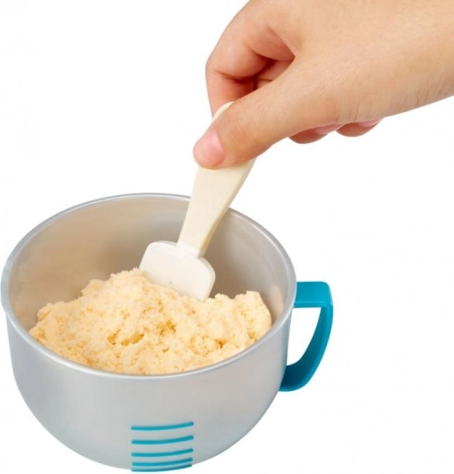 Målebæger med markeringer og spatel til præcis blanding