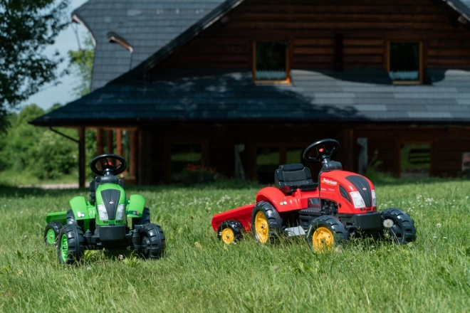Trampetraktor med trailer rød