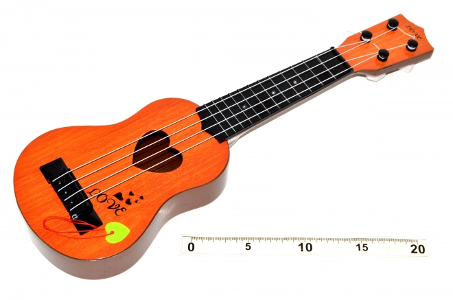 Guitar med plektre 43 cm
