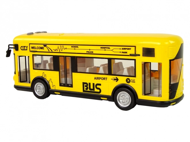 Gul bybus med friktionstræk 1:18