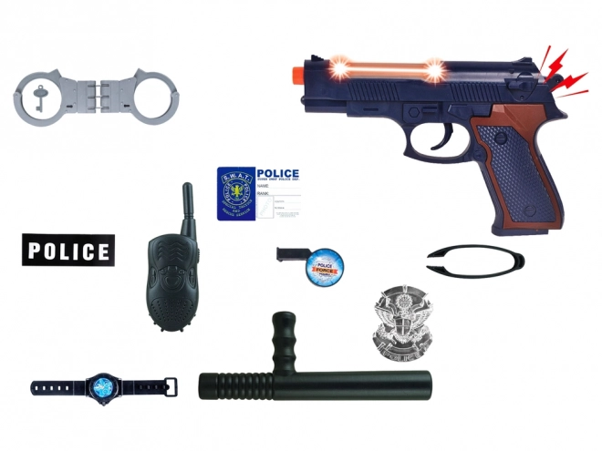 Stor politisæt med pistol, lyd og badge