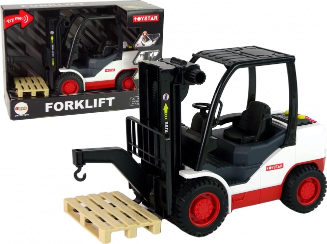 Legetøj – rød‑hvid gaffeltruck med lyde og lys samt palle