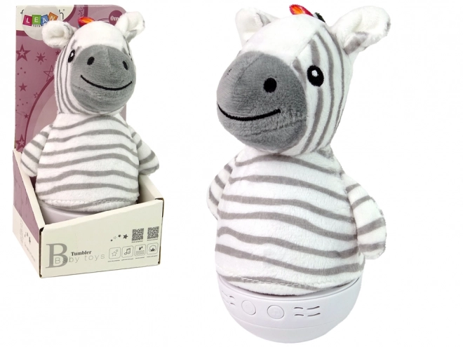 Børnegyngende zebra med lampe og melodi
