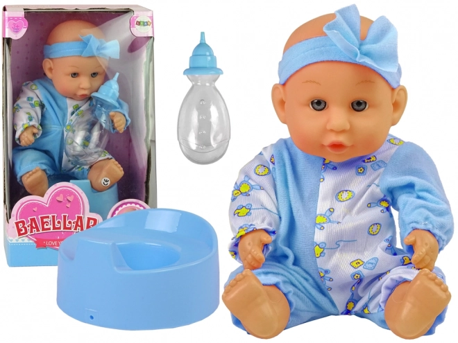 Dukke baby på potte med blå sløjfe