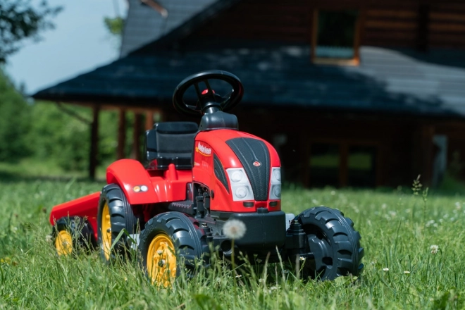 Trampetraktor med trailer rød