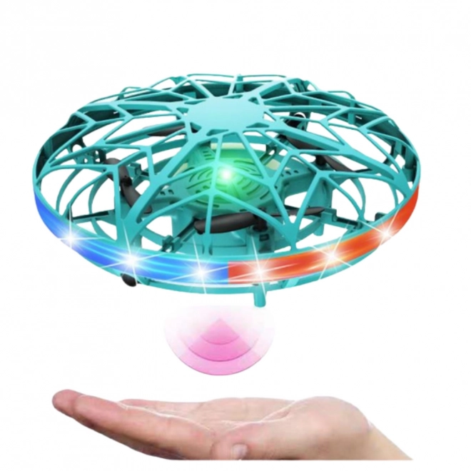 Drone UFO styret med hånden med LED-lys turkis