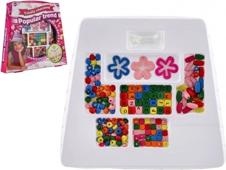 Kreativt sæt med farverige perler og snor