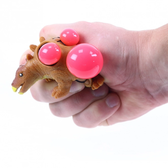 Dinosaur stressbold med huller