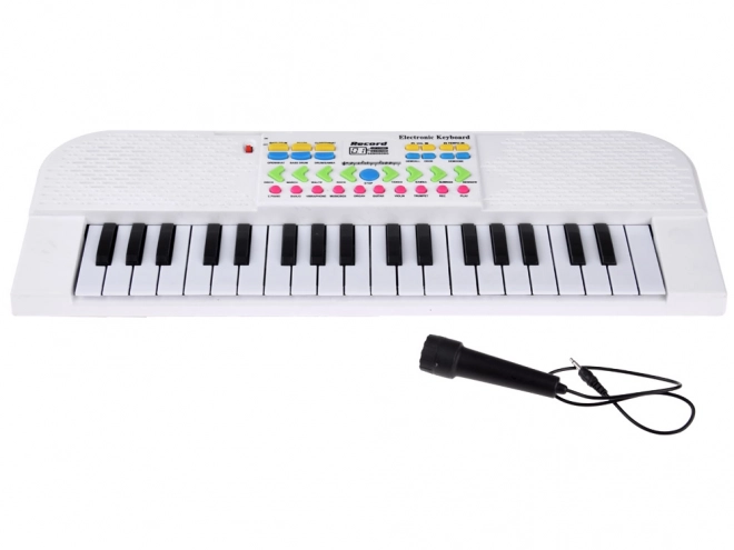 Elektronisk børnekeyboard med mikrofon