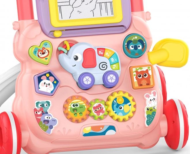 Interaktivt gåstativ Woopie Baby med musik og tavle
