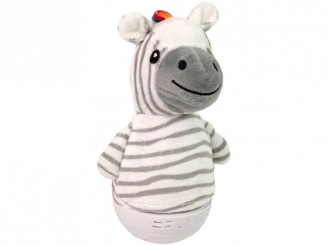 Børnegyngende zebra med lampe og melodi