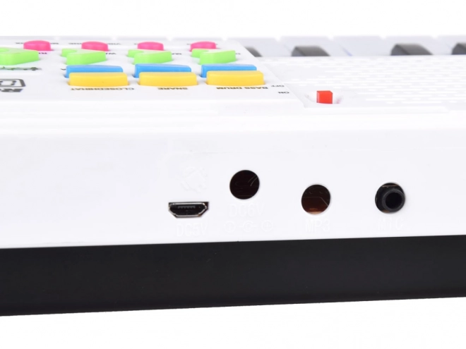 Elektronisk børnekeyboard med mikrofon