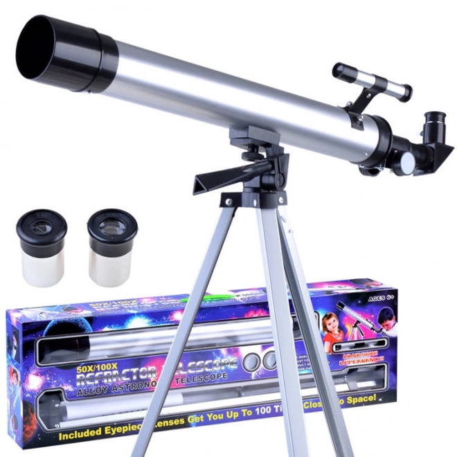 Børneuddannelsesteleskop på stativ med zoomoptik