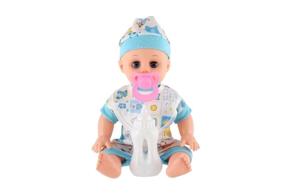Panenka babydukke plast 32 cm fast krop drikker, tisser på batterier med lyd og tilbehør i pose