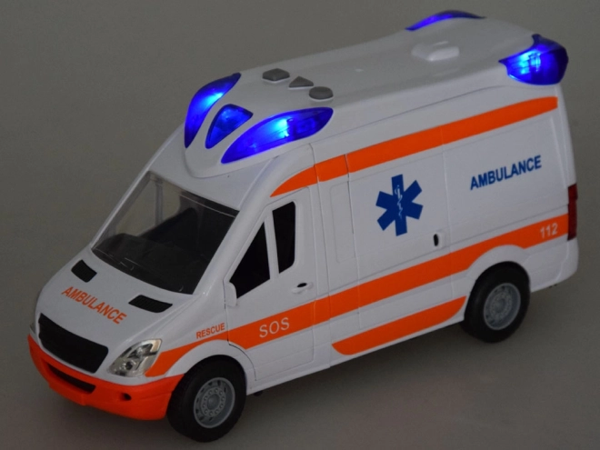 Børneambulance med båre og lyssignaler