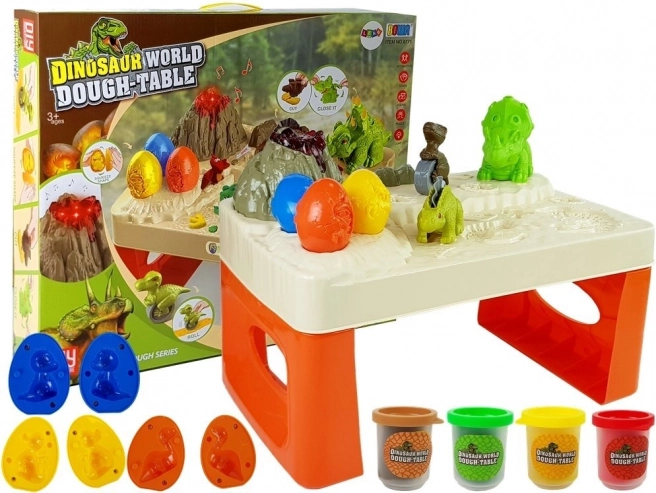 Dinosaur-legebord med modellervoks og lysende lava