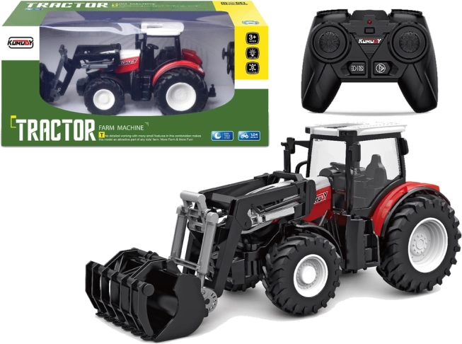 Rød fjernstyret traktor 2,4 GHz med bevægelig skovl 1:24