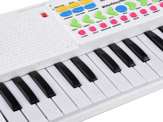Elektronisk børnekeyboard med mikrofon