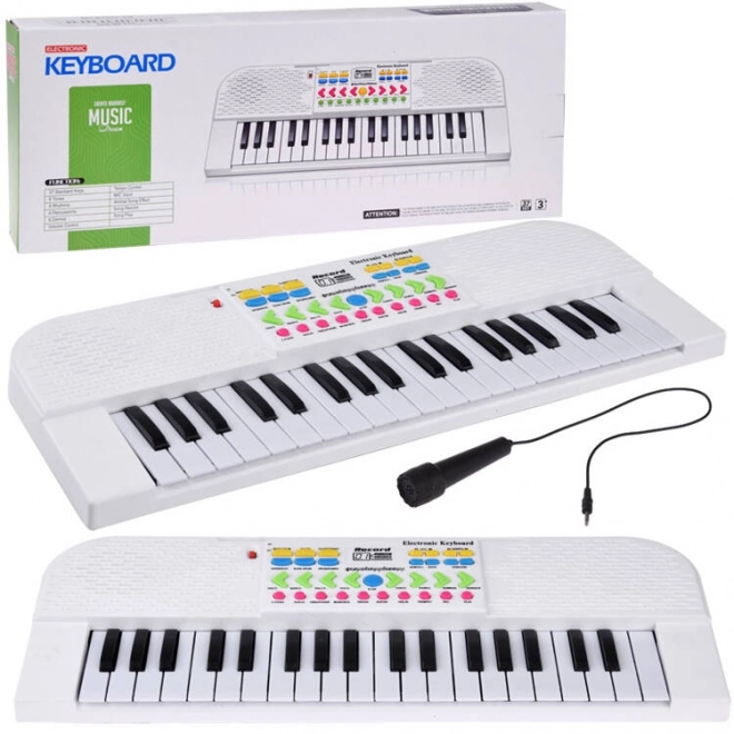 Elektronisk børnekeyboard med mikrofon