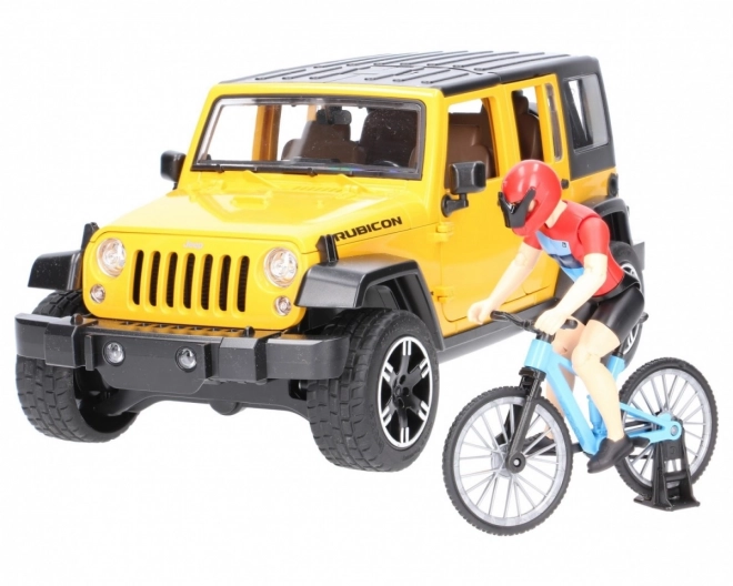 Bruder Jeep Wrangler Rubicon med cyklist og cykel