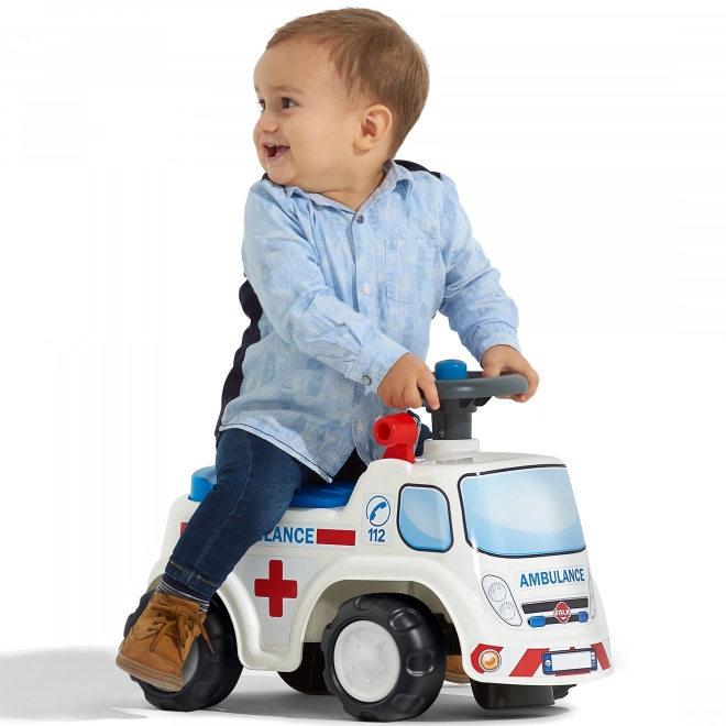 FALK Løbecykel Ambulance med åbent sæde og horn på rattet