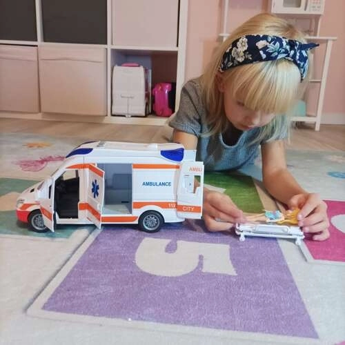 Børneambulance med båre og lyssignaler