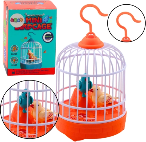 Syngende fugle i bur – orange, lys og lyd