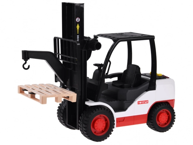 Stor gaffeltruck med palle