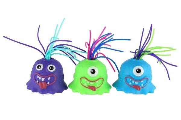 Monster med sugekop plastik 7cm på batteri med lyd, lys 3 farver i kassen 12 stk i æske
