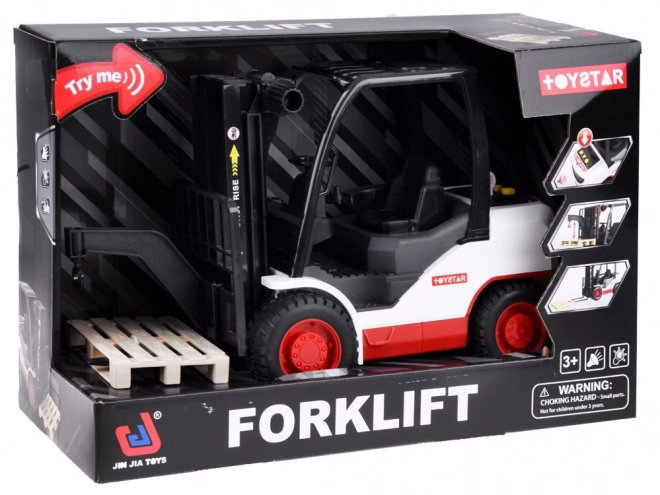 Stor gaffeltruck med palle