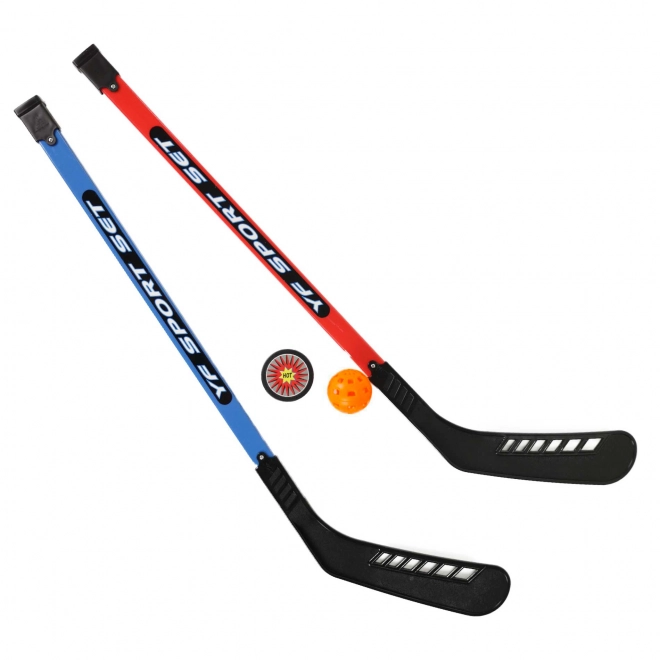 Hockeystænger med bold og puck
