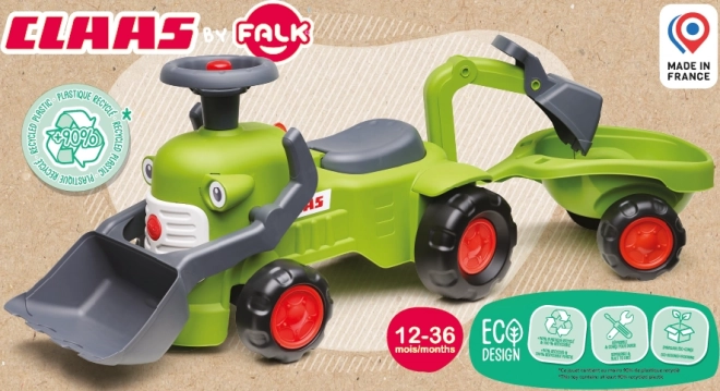 Kørende traktor Claas med trailer, læsser og skovl