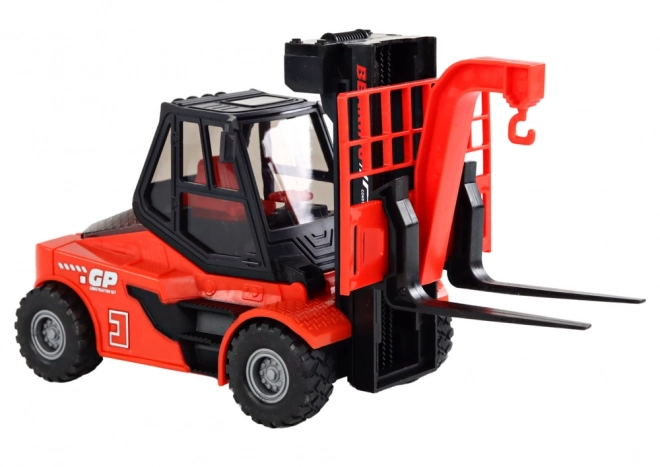 Rød gaffeltruck 1:16 med bevægelige gafler, lyde og lys