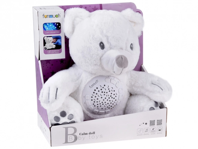 Plys bamse med melodier og projektor