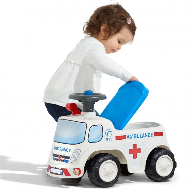FALK Løbecykel Ambulance med åbent sæde og horn på rattet