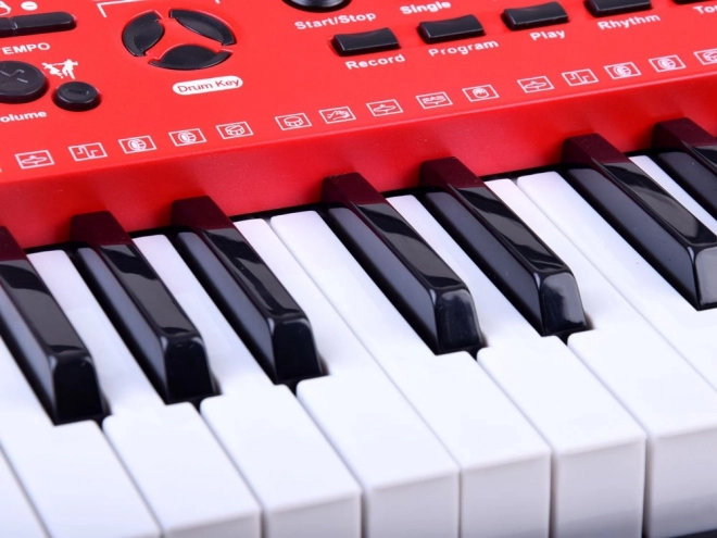 Elektroniske tastaturer med mikrofon