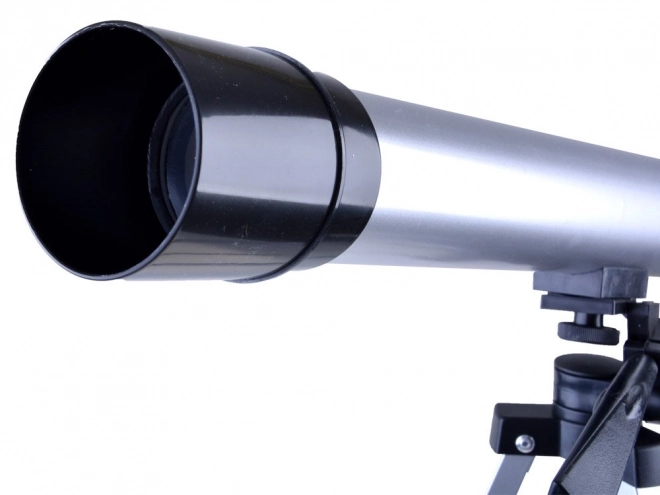 Børneuddannelsesteleskop på stativ med zoomoptik