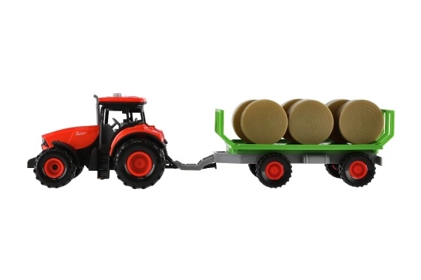 Traktor Zetor med anhænger og plastballer 36cm med friktion kører på batteri med lys og lyd i æske 39x13