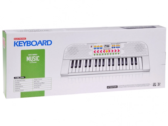 Elektronisk børnekeyboard med mikrofon