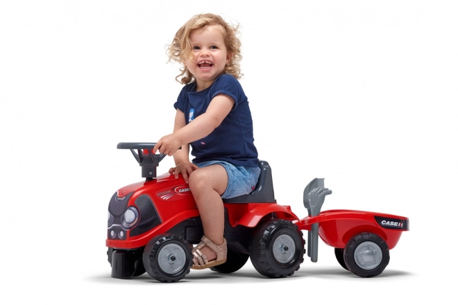 Kørende traktor Baby Case IH rød med trailer