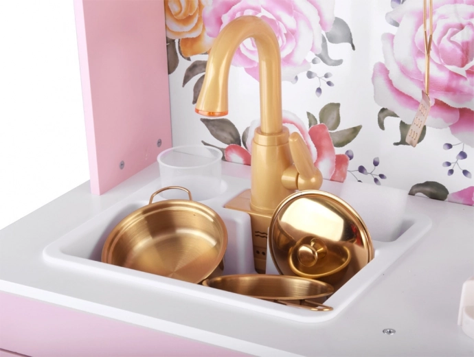Funktionel vask med gyldent armatur
